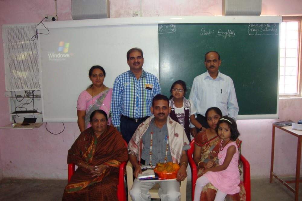 Branch Manager Kumaraswamy with the unique moment of our development officer's family congratulating my family on the achievement of MDRT